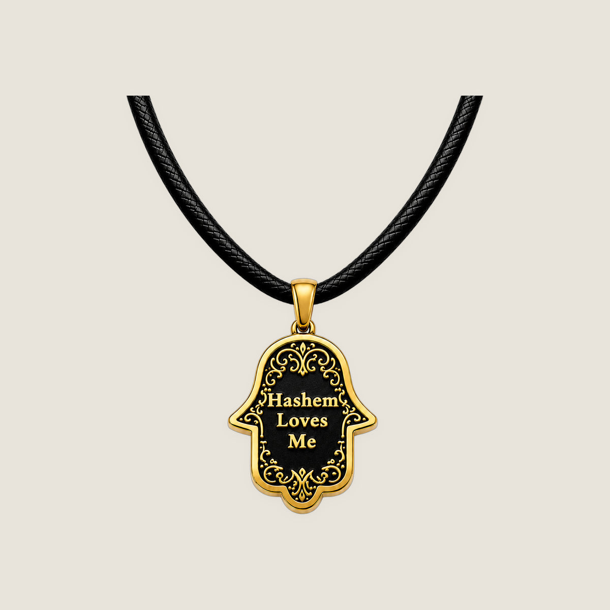 The Hamsa Pendant in Gold Noir on black rope — Hashem Loves Me jewelry